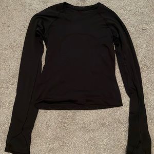 size 2 lightly worn swiftly tech small rip in elbow